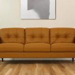 The Longhorn – Orange Leather Sofa with Black Legs